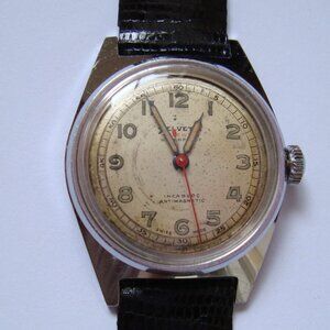 VINTAGE WIND UP HELVETIA  17 JEWELS